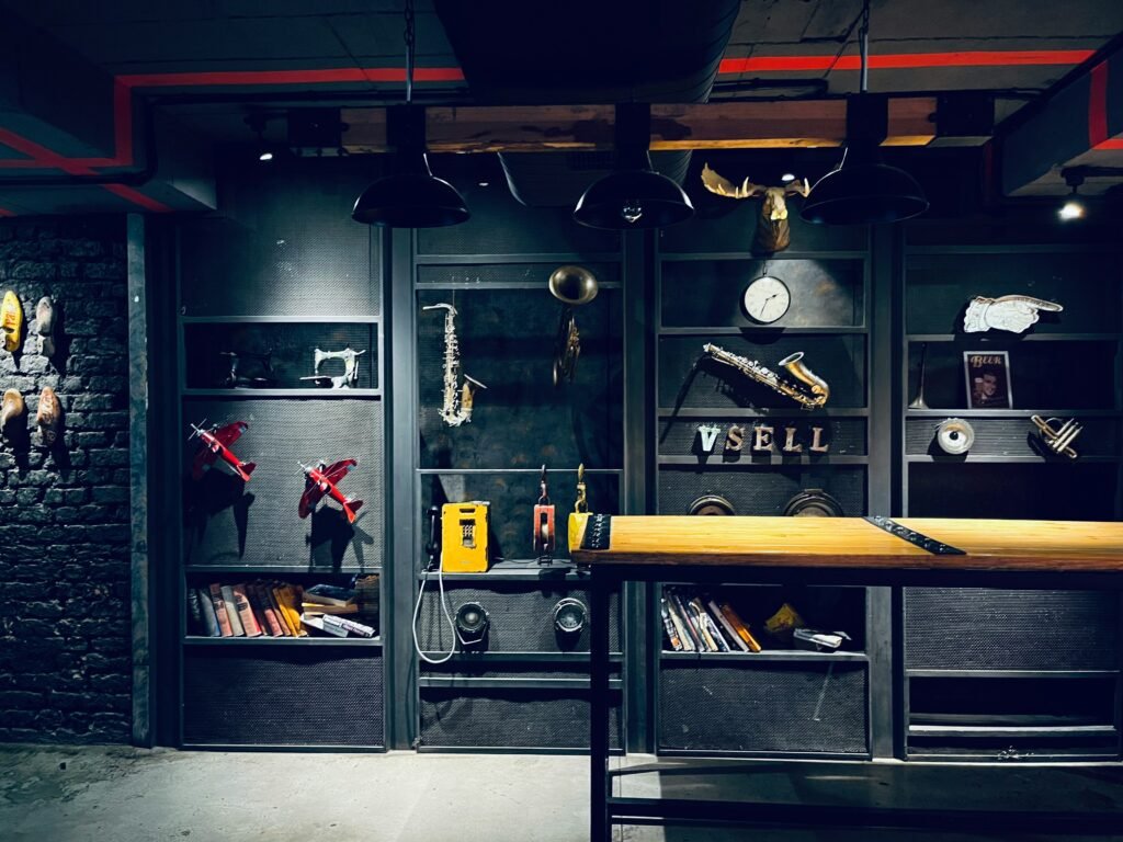 Garage interior with shelves displaying various tools and objects.