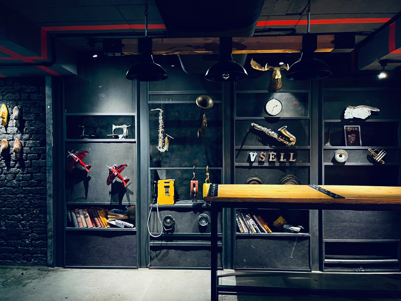 Garage interior with shelves displaying various tools and objects.
